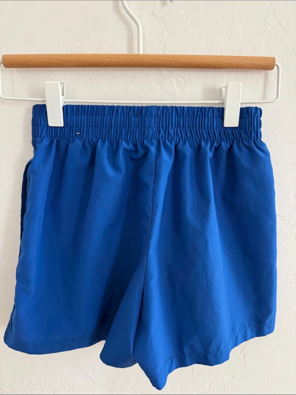 Nike Blue Athletic Shorts with White Swoosh